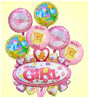 Bouquet of It's a Girl Mylar balloons at Carolyn's Gift Creations